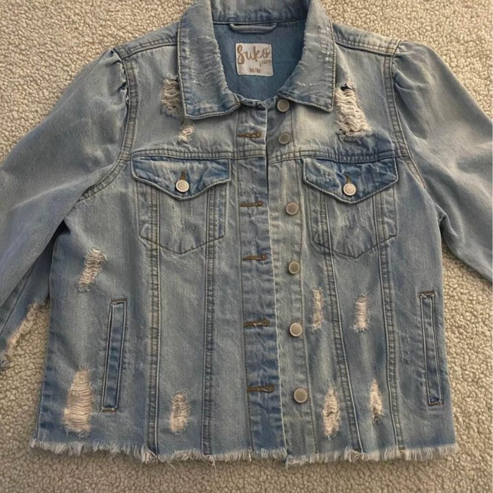 Light denim wash Jean jacket with distressed detailing
